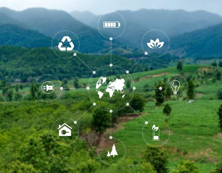 Sustainable Science and Technology Landkreis Göppingen Grafik in der Mitte eine Weltkugel außerhalb sind Nachhaltigkeitsicons. Im Hintergrund ein Landschaftsbild